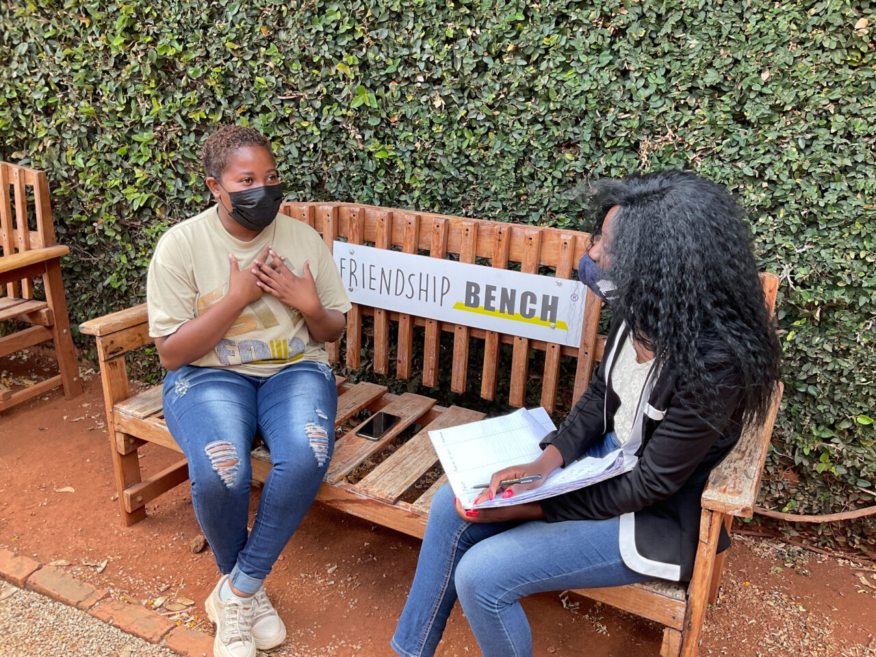 Client session on the Friendship Bench, Zimbabwe. Credit: The Friendship Bench